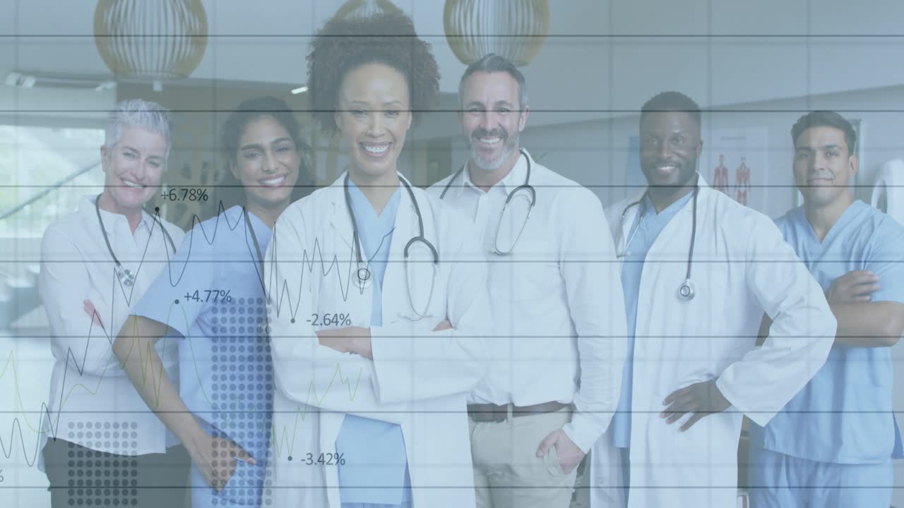 Medical team standing, grid fading in starting line graph illustrating fluctuating health metrics