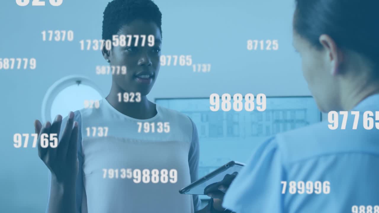 Animation of data processing over diverse business people talking in office