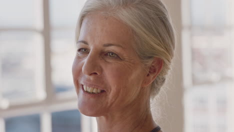 portrait happy elderly caucasian woman enjoying yoga class smiling cheerful middle aged female practicing healthy fitness lifestyle in workout studio