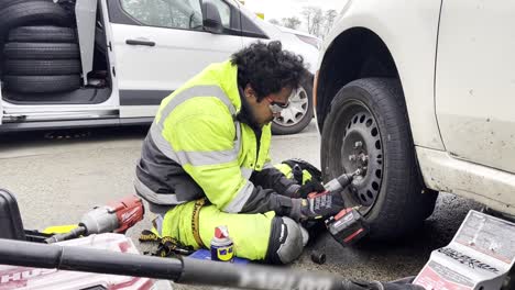 latin man working as a roadside assistance