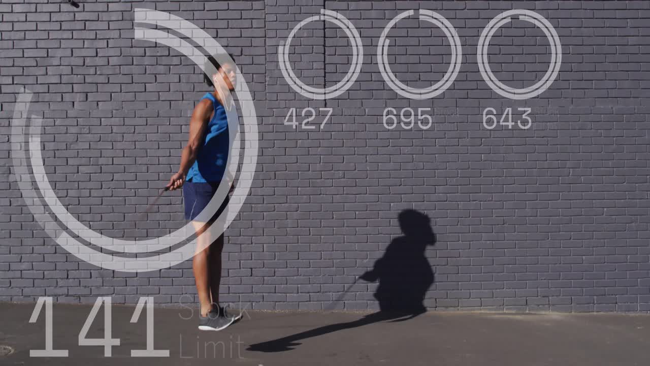 아프리카계 미국인 남자가 로프를 뛰어넘는 데이터 처리의 애니메이션.