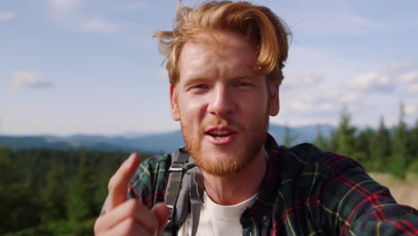 Couple-having-video-conversation-in-mountains