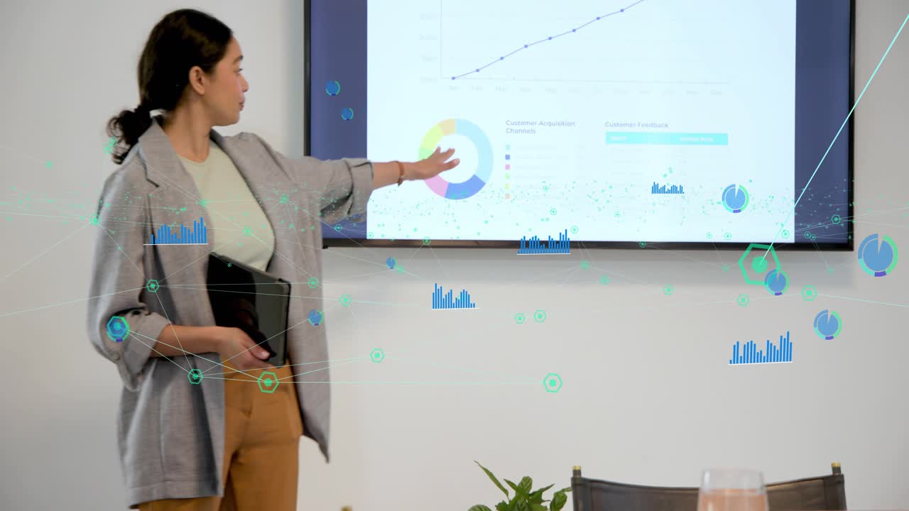 Presenter tapping tablet and gesturing, walking center and explaining business charts with overlays