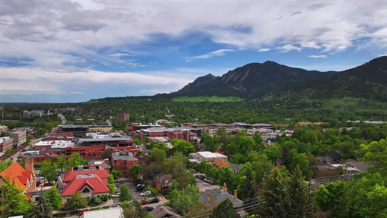 Pearl Street Mall Eben G Fine Boulder creek front range college town of University of Boulder Colorado Chautauqua Park Flatirons aerial drone summer spring Green mountain blue sky sunny upwards motion