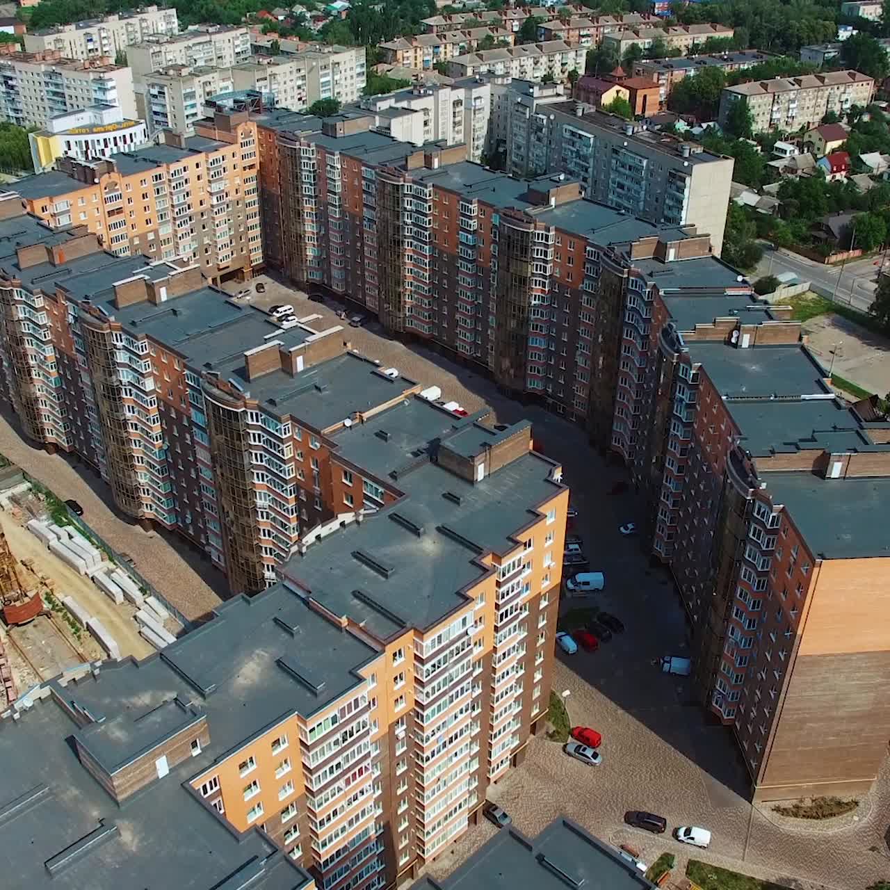 Modern city complex. High-raised buildings in the center of the city. New residential apartments. Aerial view.