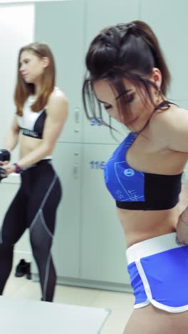 locker room sportive women getting ready for fitness training