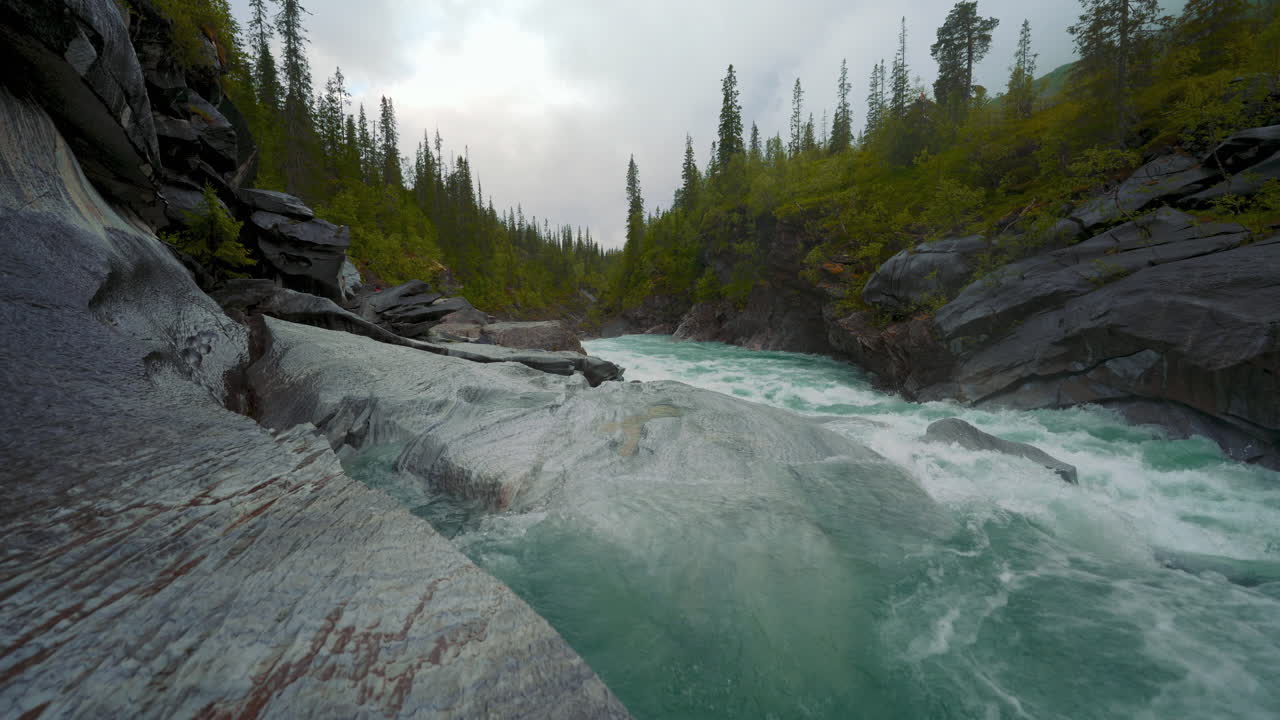 Rapid River Flowing Through Rocky Gorge