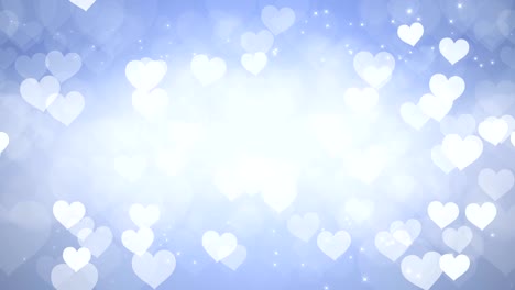 los corazones abstractos con fondo azul bokeh.