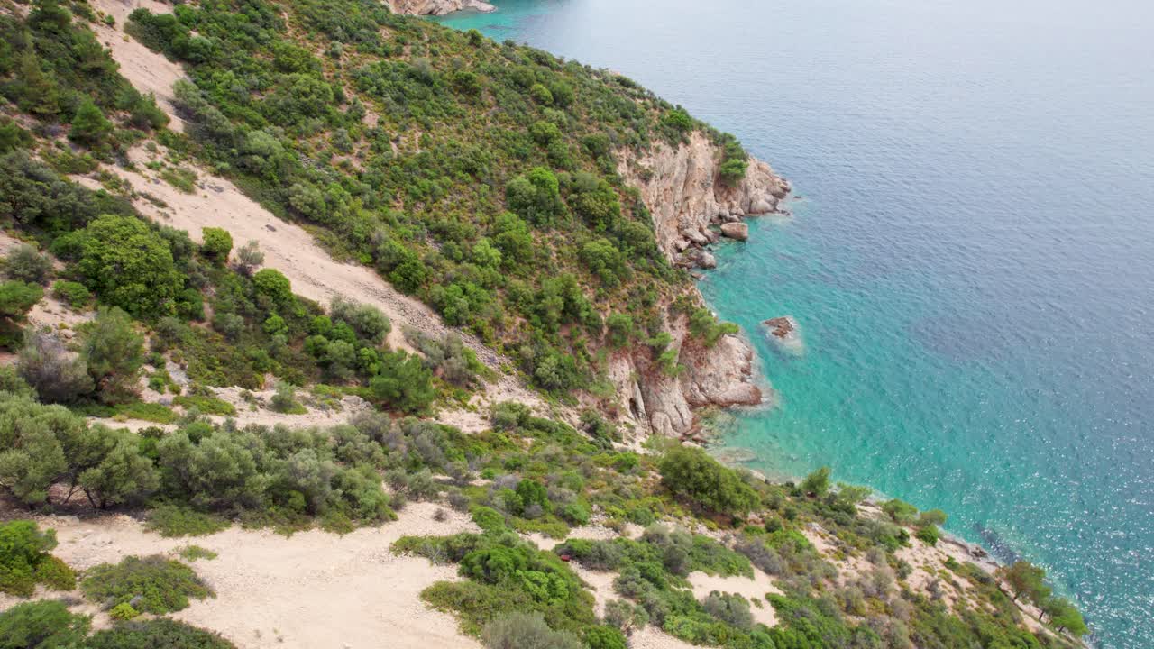 Top Down View Over A Rocky Seaside, Turquoise Water, Lush Vegetation, Fari Beach, Thassos Island, Greece