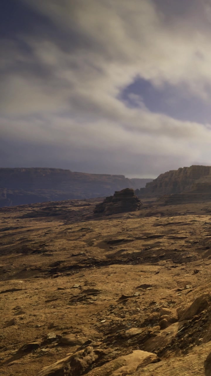 Dramatic landscape showcases rugged cliffs and expansive sky at sunset