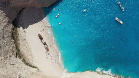 beautiful bright hidden shipwreck beach in zakynthos, greece -aerial