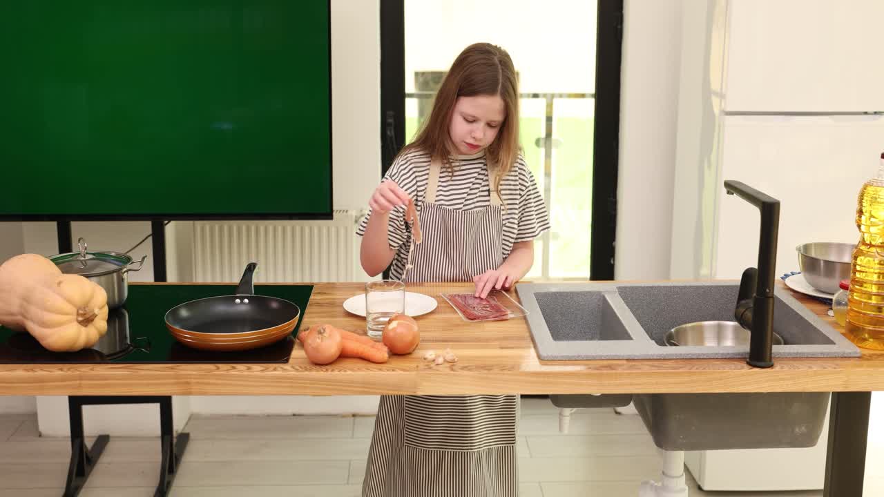 Girl cooking in the kitchen