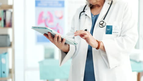 Tablet,-hands-and-closeup-of-woman-doctor