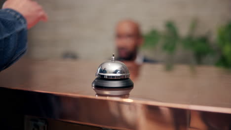 hotel reception desk with bell