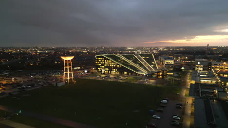 Drone-rotates-around-Corda-Campus-at-sunset