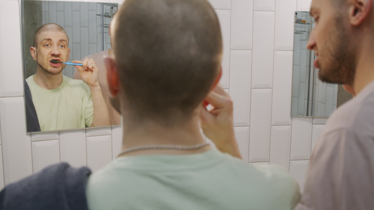 Loving Same-Sex Couple Brushing Teeth in Morning