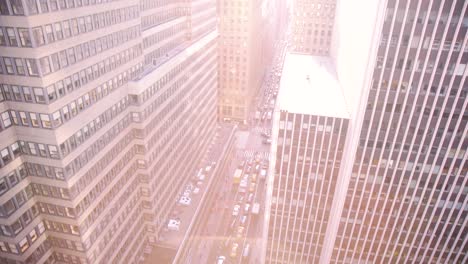 Tilt-up-from-a-New-York-City-traffic-jam-straight-into-the-sun-at-sunset---includes-lens-flare