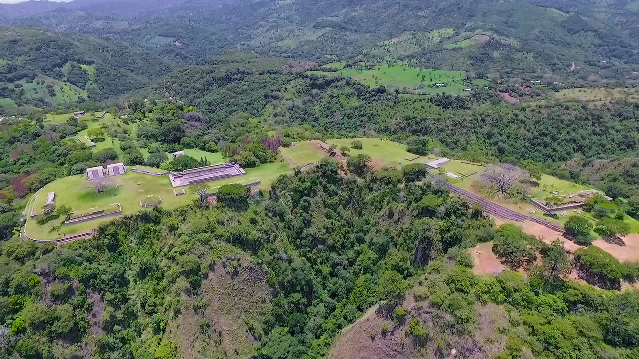 A beautiful sunny day in the green forest on the mountains of Tikal ruins.
