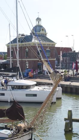 canal scene with boats and historic building