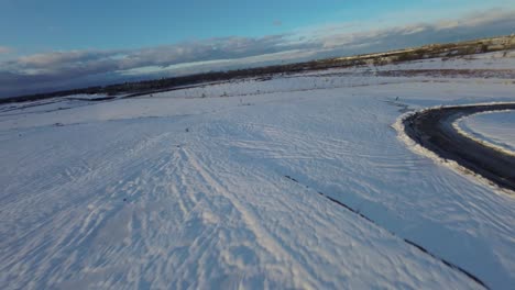 snow covered park area in montreal at sunset