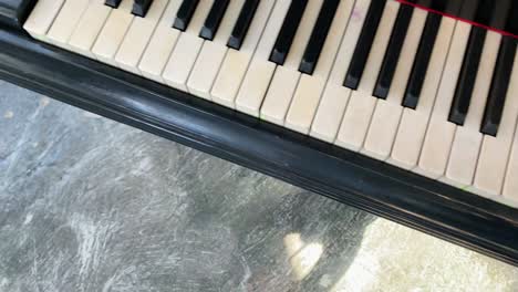 close-up slow move over classic old grand piano keyboard. suitable for music videos, music schools promotion