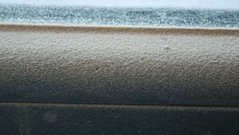 closeup of snow on a car