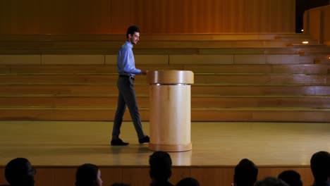 male business executive giving a speech