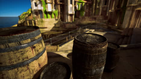 view of rustic barrels near a tranquil body of water in a scenic landscape