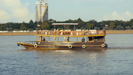 tonle river in phnom penh cambodia southeast asia tourist boat sailing
