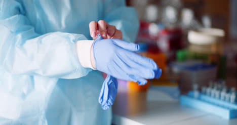 scientist wearing protective gloves health care clinic