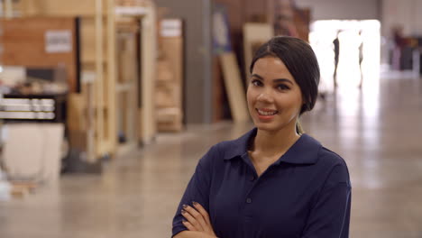 Female-Factory-Worker-Walks-Towards-Camera-In-Slow-Motion