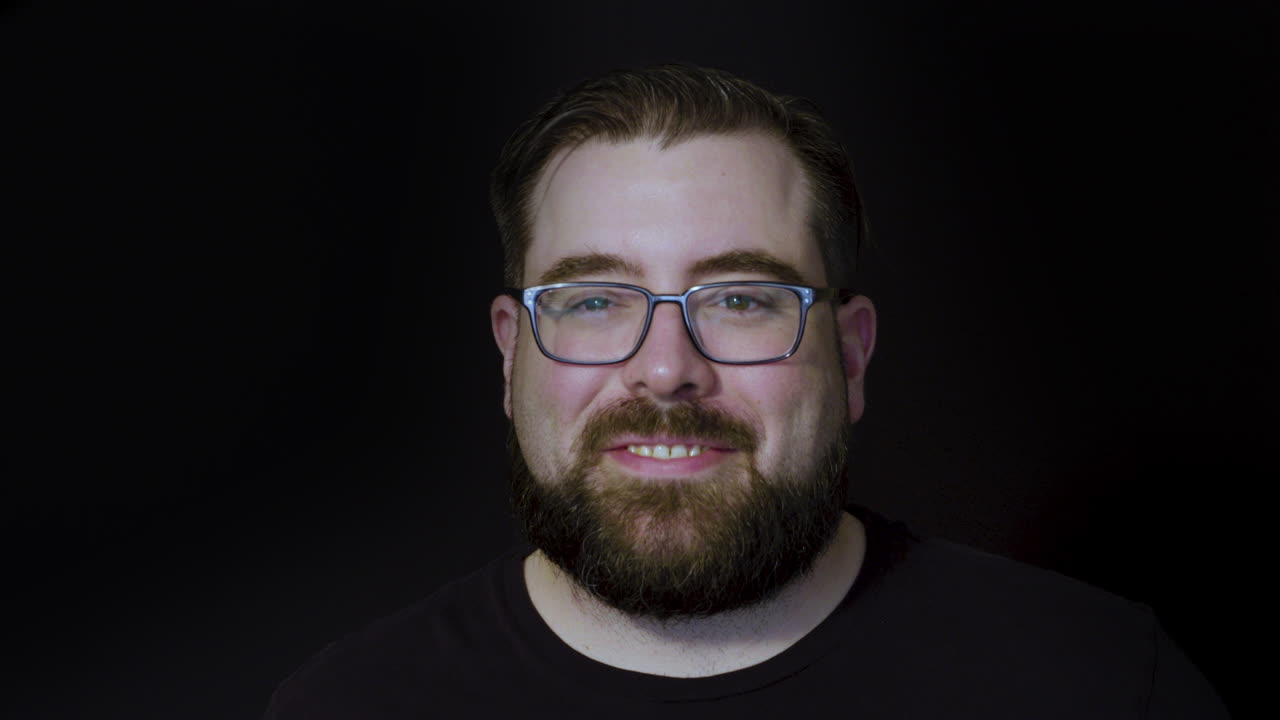 Motion studio portrait of a bearded man enjoying a delicious cup of coffee