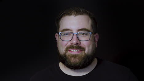 motion studio portrait of a bearded man enjoying a delicious cup of coffee