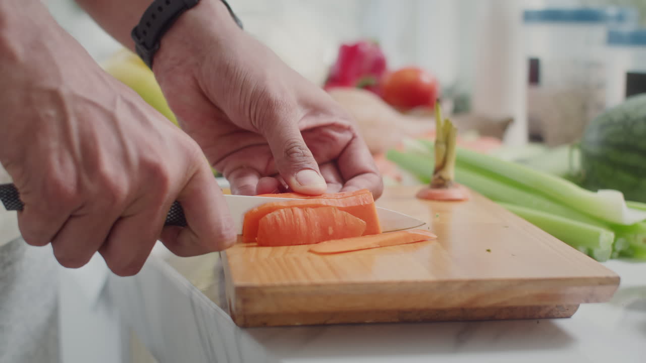 Cook Cutting Carrot Making Salad for Lunch