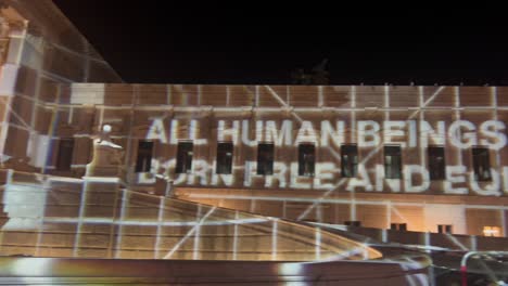 ''all human beings are born free and equal'' sign on parliament building in vienna, austria