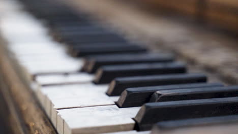 macro of ancient upright broken piano keys