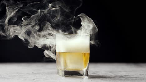 Slow-motion-video-of-smoked-cocktail-on-dark-background