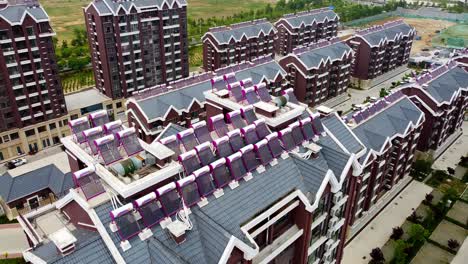new houses and main entrance of the urbanized residential complex in nanhai new district, china