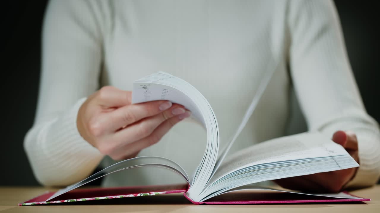 Woman Reading an Open Book