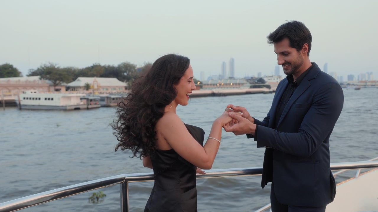 Man Proposes to Woman with Ring on Luxury Yacht