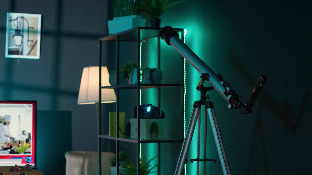 Modern comfortable loft apartment with neon lights and stylish decor, indoor plants and a smart tv setup for a young man living alone. Minimalist cozy corner in the living space.