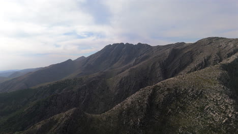 drone descends over sierra de la ventana mountains, highlighting ridges and valleys - buenos aires, argentina