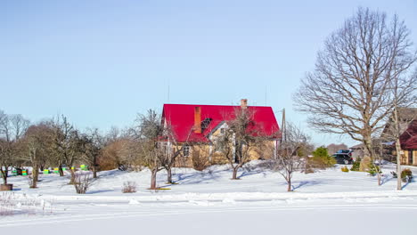 timelapse: snow covered frozen area with residential home