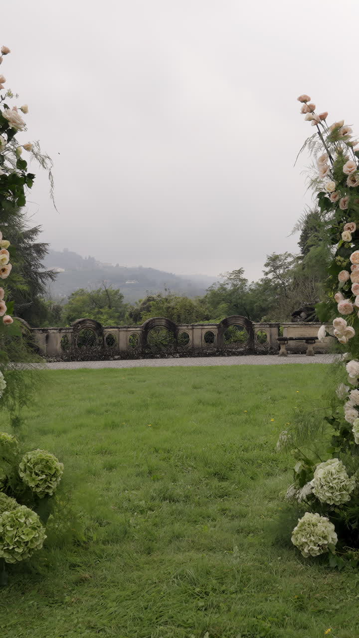 Scenic Garden View Framed by Floral Arrangements