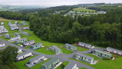 drone pan of caravan park in uk countryside