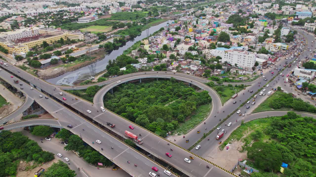 vehicles going in maduravoyal bypass flyover bridge in chennai, tamil nadu, india. stable drone shot, 4k, daytime