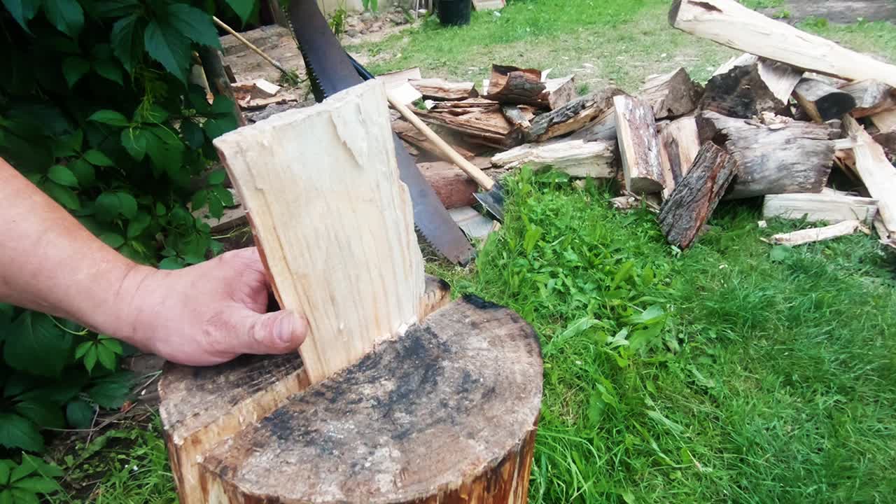 A Wooden Wedge is hammered into the Split Block. Slow Motion Shot
