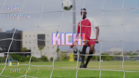 Animation-of-kick-text-on-video-camera-screen-with-digital-interface-filming-footballer