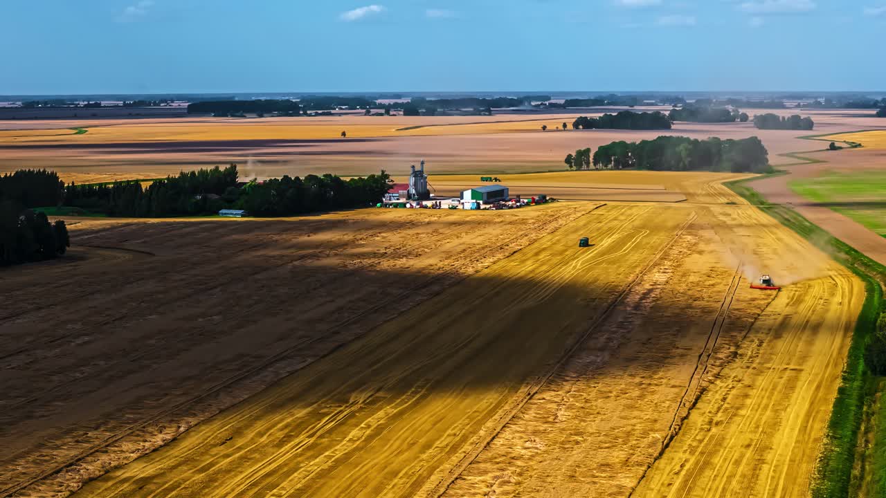 Farming scene with golden fields and rolling clouds, serene atmosphere