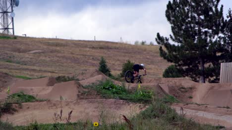 mountain biker jumping in slow motion